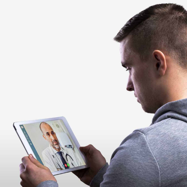 A young man is looking at a CD of a sexual health expert on the website "https://sexualhealth.website/"